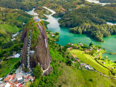 Aerial view of the Peñol stone next to the Lake or reservoir in Guatape, Antioquia, Colombia, located near the city of Medellín
